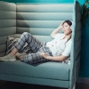 Young professionals networking in a co-living lounge